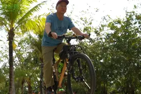 椰视频 | 梦想绕中国一圈！六旬老人骑行3400公里从河北到三亚图片