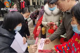 社区联合物业开展“迎元宵 猜灯谜 送汤圆”活动图片