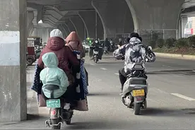 电动车带孩要使用安全座椅？装前边还是装后边？郑州出台新规图片