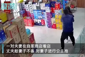 丈夫公主抱妻子放酒箱上拍照 网友：这才是嫁给爱情的样子图片