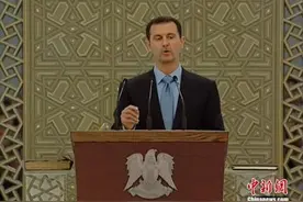 叙利亚现任总统阿萨德成功连任 吁加强建设叙利亚图片