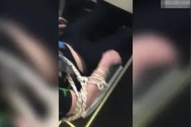 俄罗斯一女乘客吸毒后乘飞机“行为古怪”被绑在座位上图片