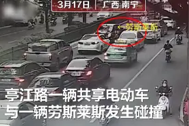 广西男子骑车撞上劳斯莱斯，立马倒地不起玩手机，现场画面曝光图片