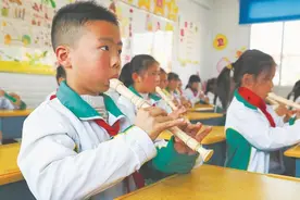 让每个孩子都能叩响艺术之门图片