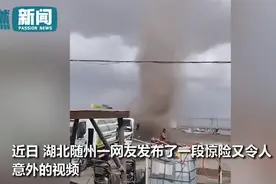 洗车大爷持水枪浇灭龙卷风，一通狂喷超淡定！网友：龙卷风不要面子吗？图片