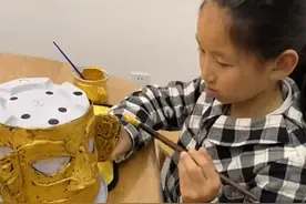 8岁小学生用橡皮泥做三星堆面具，像不像？图片