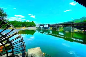 洪水冲毁的婺源“国宝”彩虹桥修复完成：五一开门迎客逾千人图片