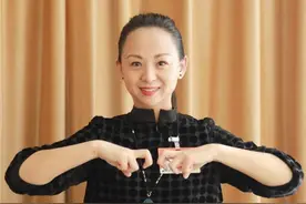 邰丽华人民日报撰文：残疾人同样可以让生命绽放美丽图片