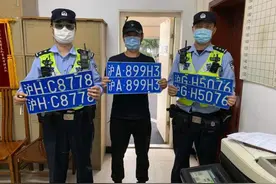 一块“沪A”车牌套用在4辆不同的车上？汽修厂老板被处记48分，罚款2万元图片