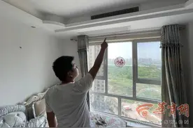 西安男子搬新家找售后清理空调 穿着“格力”工服的维修员竟不是官方售后图片