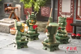 三星堆博物馆推出“六一”盲盒 文物学会变脸、打长牌图片