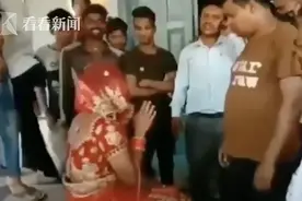 眼见女友要和别人结婚 印度男子扮成新娘潜入婚礼被识破图片