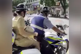 监考教师遭遇堵车险些迟到，民警用摩托车11分钟内将其送到图片