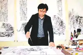 彭旺松：画写意虎 做拓荒牛图片