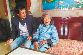 百岁老人徐存 苦荞粑粑做得溜溜圆图片