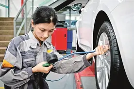 光明“汽修女孩”走红网络并登上央视图片