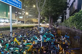 共享单车停不进电子围栏就锁不上，“叠罗汉”“蹭车族”现象频发图片