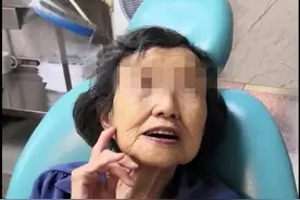合肥90岁老人缺牙40多年 装上吸附性义齿轻松啃苹果图片