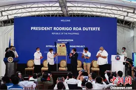 中国政府援菲帕西格河E-P桥竣工通车图片