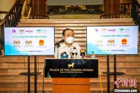 中国驻马大使看望参加“春苗行动”同胞 马方指将全力支持在马中国公民接种图片