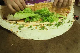 山东人的早餐江湖，全在煎饼里图片