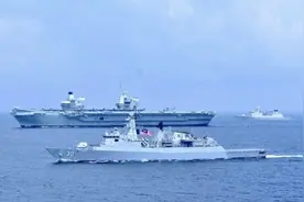 英国航母已进入菲律宾海，经过南海为何突然低调了？图片
