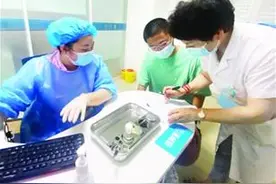 为孩子独创“拍拍”止疼法图片