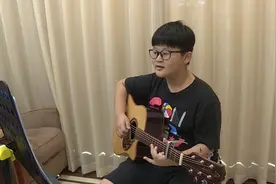 聊城阳谷12岁少年弹唱改编歌曲“声”援战疫图片