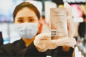 海南离岛免税商品为啥都贴上“溯源码”？图片