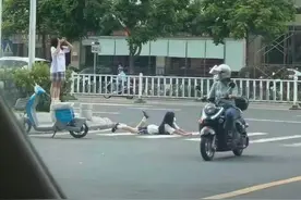 河源两女子趴斑马线上摆造型拍照！交警表示将公开视频以警示图片