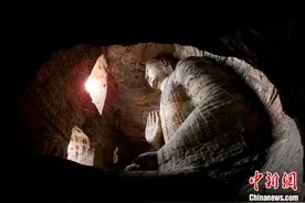 云冈石窟第19窟开放 再现释迦牟尼父子暖心造像图片