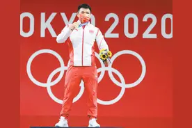 东京奥运会男子举重67公斤级冠军谌利军——“所有的付出都是值得的”图片