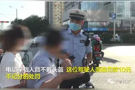 济南市区电动车载人超12岁会被罚款，后座也要戴头盔图片