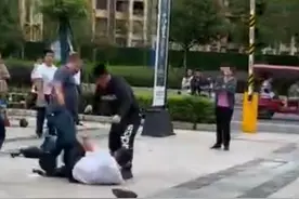 四川宜宾“大妈保安互扇耳光”警方：四男子围殴保安，涉嫌寻衅滋事被刑拘图片