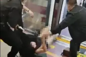 地铁保安拖拽女乘客，西安轨道交通集团正调查！称此事未了结图片