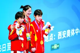 张家齐卫冕全国冠军图片