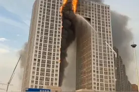 辽宁大连凯旋国际大厦火灾起火原因初步确定 为电器故障引发火灾图片
