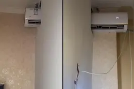 妈妈砸穿墙壁两屋共用一台空调，女儿：她说这样省电