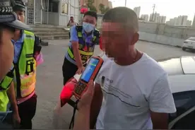 男子怕酒驾被查，用跳楼威胁交警图片