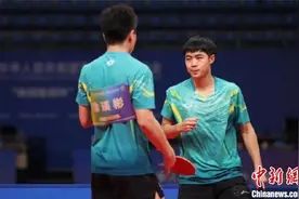 第十四届全运会乒乓球男双比赛 黑龙江组合夺得铜牌图片