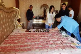 成捆现金铺满床！一起典型“杀猪盘”背后竟意外牵出亿元大案图片