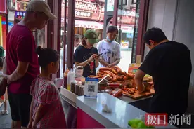 跟着味蕾游荆楚｜860米襄阳北街汇聚上百家小吃店，全国最长仿古步行街上演美食诱惑图片