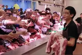 湖南顾客抢购5.98元一斤特价猪肉，超市：开业亏本赚人气质量没问题图片