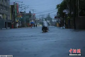 台风“圆规”侵袭菲律宾降下大雨 9人死11人失踪图片