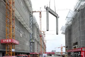 临港最大的“搭积木”住宅项目结构封顶，建筑长效保温，外墙还绝不会渗漏……图片