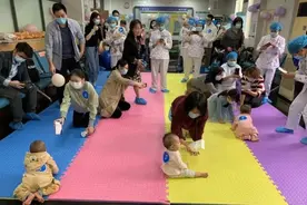 “幸福宝宝，我最棒！”广州这家医院举行亲子趣味爬行比赛图片