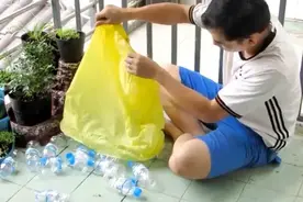 别人不要的饮料瓶，被他捡来改成精美花盆，过程引近200万人围观图片