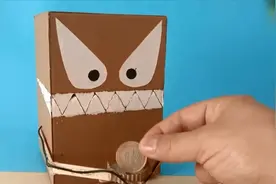 手工DIY 吃硬币的机器人存钱罐图片
