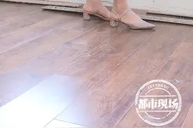 新铺的“德尔地板”还没用就鼓起大包 门店称“是正常现象”图片