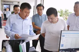 七里河区委主要领导调研区市场监督管理局工作图片